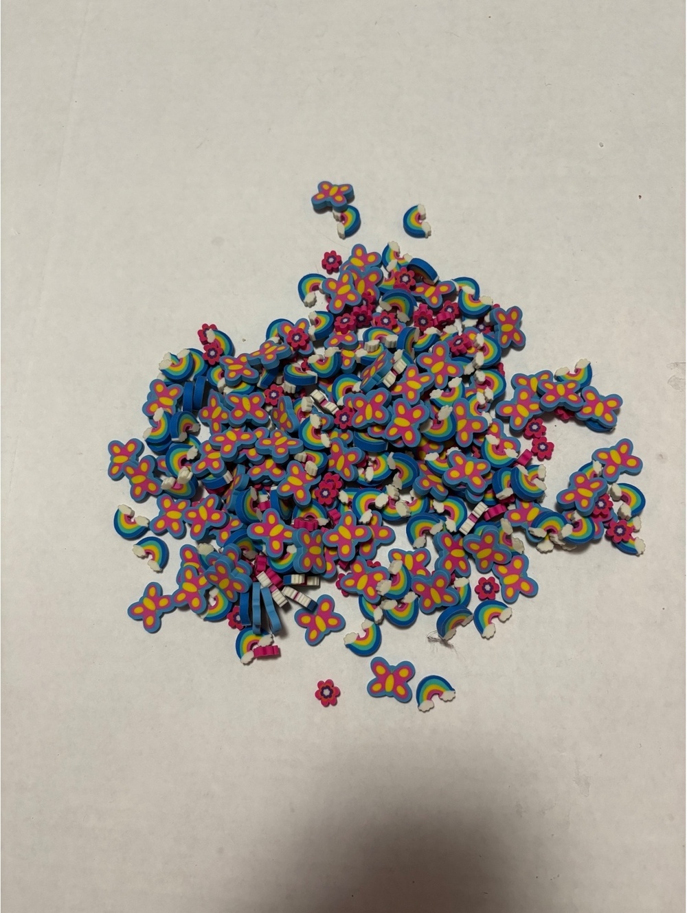 Rainbow, butterfly and flower eraser